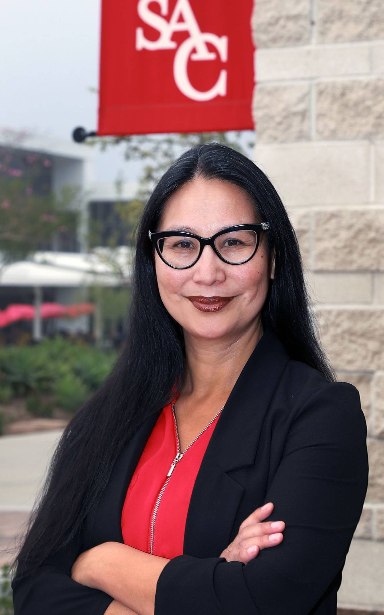 President Dr. Annebelle Nery with float right
