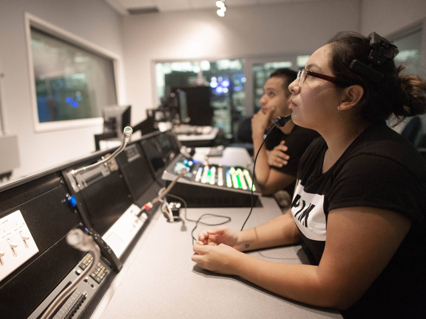 person speaking to a large crowd