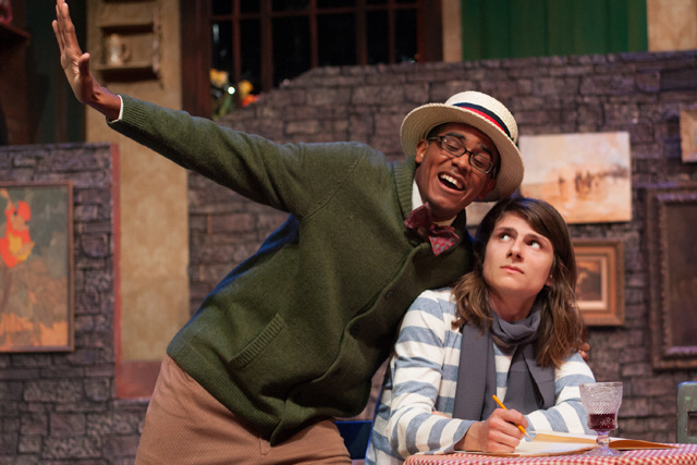 people perform in a theatre