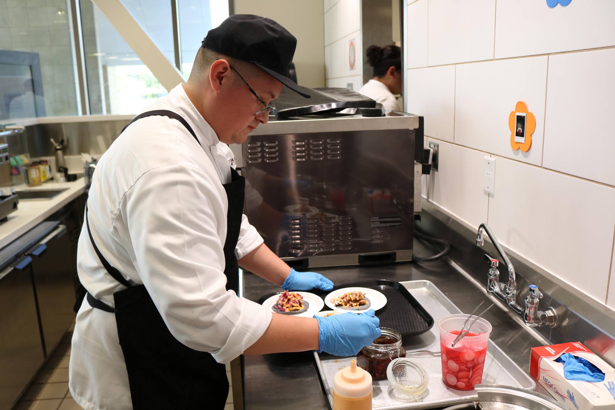 male student preparing food