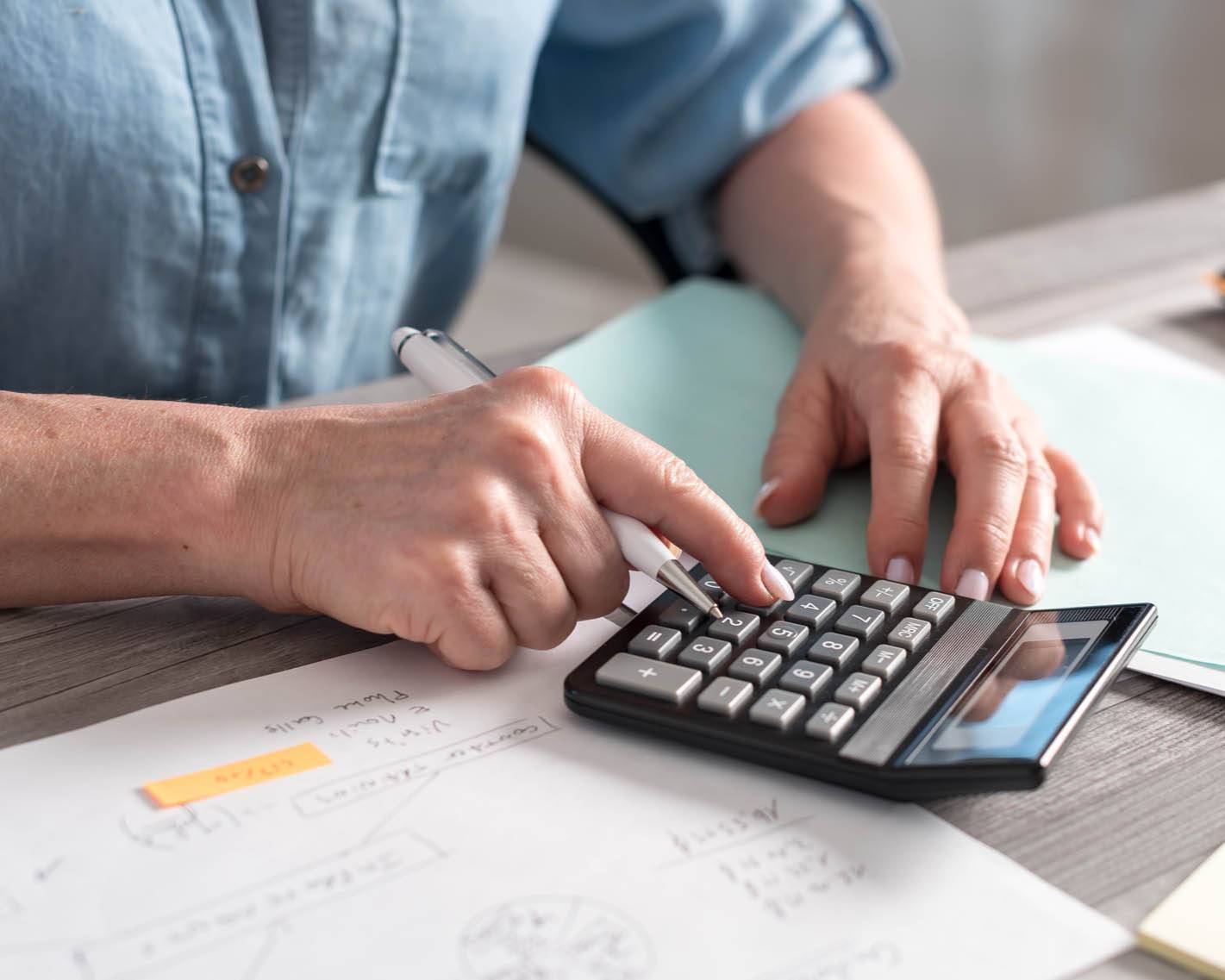 man using calculator