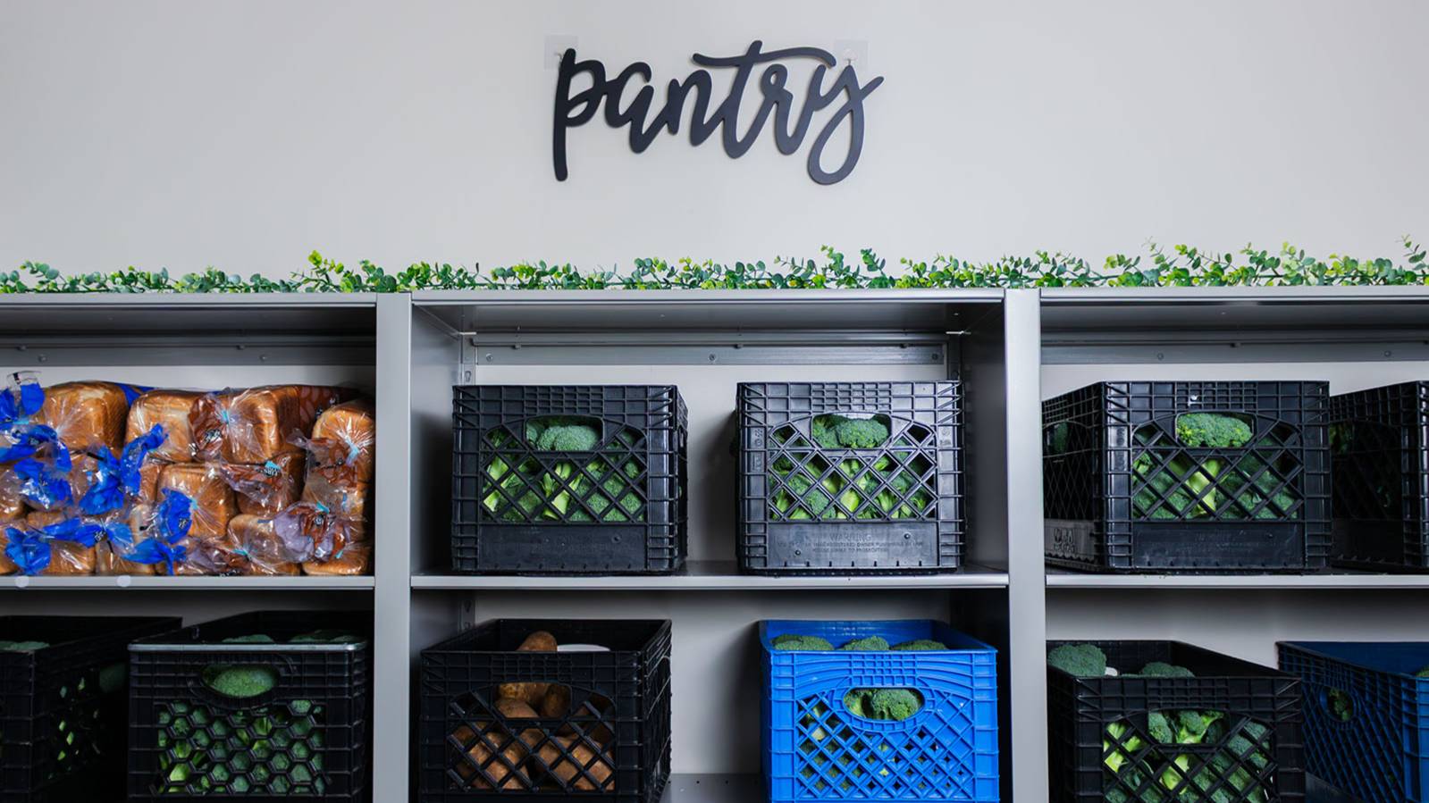 two students picking up groceries at the Thrive Center 